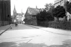 Vy från norra Tyskland, Rostock. Buchbinderstrasse ifrån fond husen, Marienkirche. Till vänster: Portamö?.