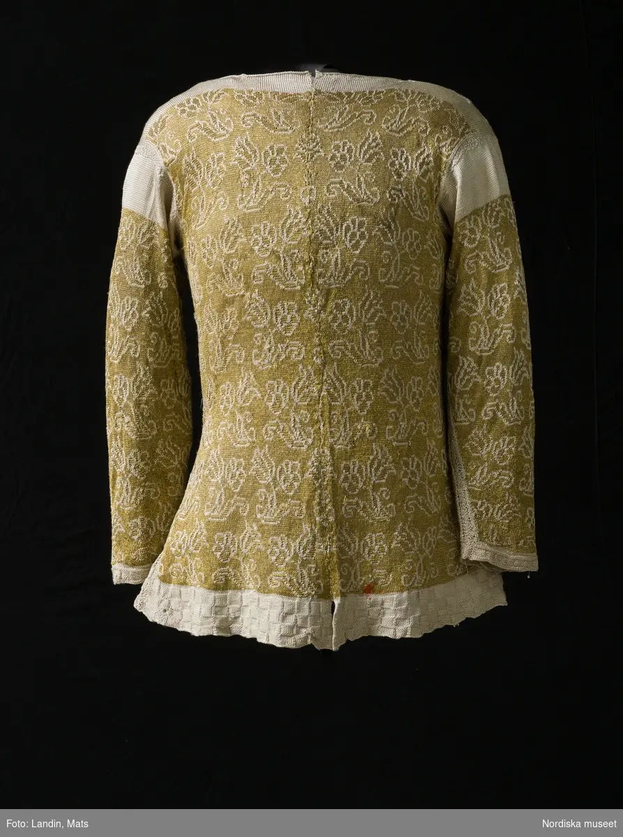 Tröja av gult silke. Silketröja. 1600-tal. 
NM  inv.nr 221941
