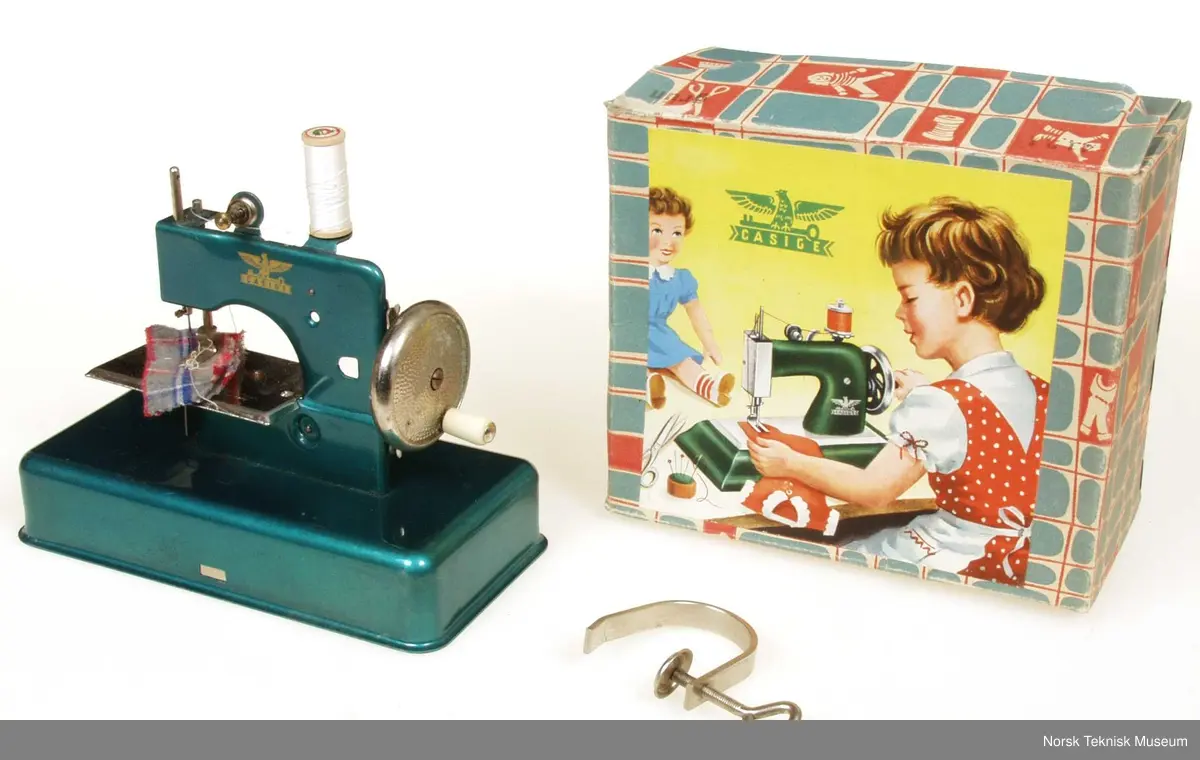 Symaskin med original eske. Bruksanvisning i esken