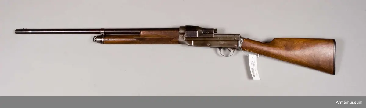 Grupp E IV e.
Automatiskt hagelgevär enligt Sjögrens system. Kaliber 16. Patent.
Märkt: Automat, system Sjögren Patent, SVA med två "kronor". Tnr 1899- (år?).