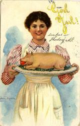 "God Jul!" Kvinna bjuder på en av högtidens specialiteter på