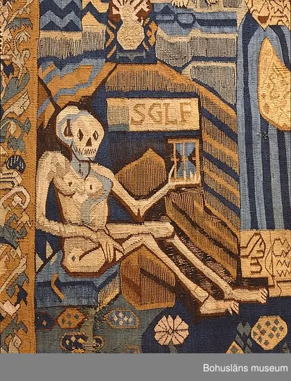 Bildvävnad från tidigt 1600-tal i lin, ull och hår. Flamskvävnad. Scener ur gamla och nya testamentet. I mitten Livets träd på vars vänstra sida återges scener ur gamla testamentet. På trädets högra sida den knäböjande jungfru Maria, Kristus på korset med omgivande bård, troligen efter försättsblad till tysk bibel 1500-talets förra hälft. Troligen nordtyskt arbete.


Ur handskrivna katalogen 1957-1958:
Gustavsbergstapeten
ÄVEN KALLAD GULLMARSBERGSTAPETEN.
DEPOSITION I APRIL 1947 AV GUSTAVSBERGS BARNHEM ENLIGT LAPPKATALOG. 242 x 205 cm.