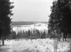 Vy från höjd ut över landskap, oidentifierad, troligen 15 januari 1909