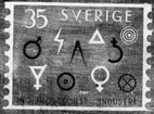 Frimärksförlaga till frimärket Ingenjörskonst och Industri, utgivet 27/5 1963. Övre raden från vänster: symboler för järn, elindustri, arkitektur, vattenkraft, bly, skogsindustri. Nedre raden: Svavel, guld, koppar, verkstadsindustri. 
Originalteckningar utförda av konstnär Pierre Olofsson. (I Postmusei samlingar). Originalteckning 1) Lavering 21,5 x 27,5 cm (17 x 24). Valör 35 öre.