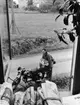 Lantbrevbärare, motorcykelåkande Holger Österberg på ön Möja
(I Stockholms skärgård) den 3/8 1956.