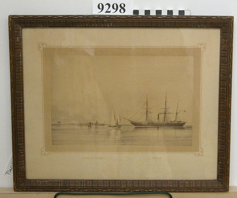 Visar ångkorvetten Gefle och monitoren John Ericsson under gång i Karlskrona skärgård. Märkt på kartongen John Ericsson  Gefle.
(Ångkorv. Gefle byggd vid ÖVK år 1847,  Monitoren John Ericsson byggd vid Motala verkstad år 1865)
Inom glas och ram.