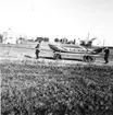Neg nr 321, Den färdiga båten transporteras på vagn till vattnet. Foto 7.10 1962.