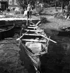 Uppland, stockholms län, Frötuna skeppslag, Länna socken, Gåsskär. segelsömmare Örlund vid sin båt.