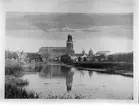 Reprofotografi - Fyrisån och Uppsala domkyrka med de Hårlemanska huvarna, Uppsala