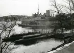 Depåfartyget Patricia och 1:a ubåtsdivisionen (Sjöormen, Najad och Sjöhästen) vid Skeppsholmen i Stockholm år 1949.