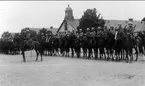 Uppställning och avlämning före sommarmarschen 1931. Tropp ur 3.skv med troppchef sergeant Magnusson.