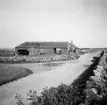 Bua by, Halland
Exteriör

Svensk arkitektur: kyrkor, herrgårdar med mera fotograferade av Arkitekturminnesföreningen 1908-23.