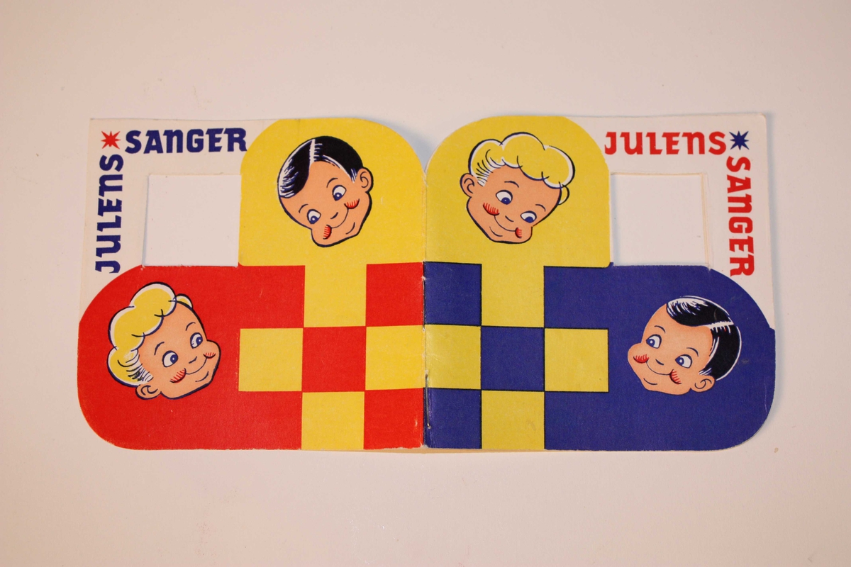 Utforma som ei julekorg i raudt og gult på eine sida, blått og gult på den andre. Teikning av Perle og Bruse, Hansa Bryggeri sine reklamefigurar, på begge sider. Tekst: Julens Sanger. 
Songheftet kan hengast på juletreet. 16 s., 14 songar, m.a. Hansa sin reklamesong "Nissesangen".