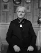 Födelsedagsporträtt - vaktmästarhustrun Emma Eriksson, Uppsala 70 år, 1935
