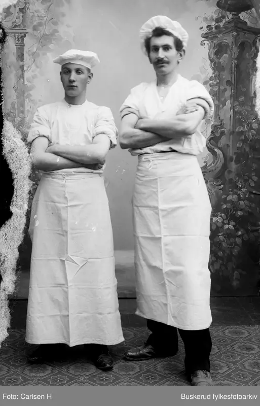 Portrettbilde av to bakere