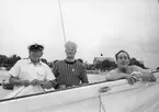 Besättningen på 6-L21 KLARA STJÄRNA under Sandhamnsregattan 1938. Fr v t h Georg 