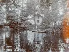 En och en halvvånings bostadshus.
Två barn som badar, två flickor och en pojke i en eka på Svartån.
Ladugårdsföreståndare Rosén