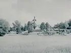 Ramsbergs kyrkan från Stråssavägen och Konsum.