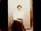 En kvinna.
Ester Åkerstrand