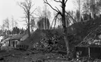 Gyttorp 1 23  februari 1967

På bilden syns rester av byggnader efter explosionen.