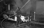 Brand Engelbrektsgatan 8.
28 januari 1966. 
En bil av märket Volvo Amazon.