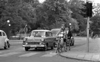 Tema I väntans tider 1 april 1965

Väntan vid trafikljus, cyklister och bilar.