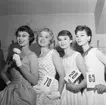 ÖK:s mannekänguppvisning.
4 april 1955. 
Från vänster: Gunilla Pontén, Marianne Thörnkvist, Inger Åhman och Lena Madsén.