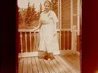 Förlovningsresan, juni 1922.
Margit Palmaer på verandan.