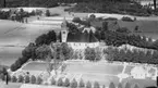 Flygfoto över Askers kyrka.
Bilden tagen för vykort.
Förlag: Ernestams, Asker.