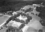 Flygfoto över Finnerödja kyrka.
Bilden tagen för vykort.