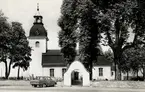 Ekeby kyrka, exteriör.
Bilden tagen för vykort.