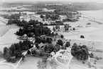 Flygfoto över Sjölunda, bostadshus och byggnader.