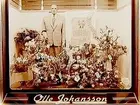 Olle Johanssons kläder, skyltfönster. 
10-års-jubileum.