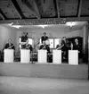 Frank Linds orkester, åtta män med musikinstrument.