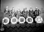 Six Sailor Boys, sex män  med musikinstrument.