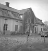 Bostadshus. Två män.
13 maj 1952.