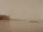 8/9 1914. En båt i  sjön