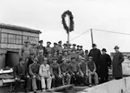 Grupporträtt vid taklagsfirande, Uppsala sannolikt 1945