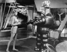 Motiv från filmen Förbjuden värld 1959, originalets titel Forbidden planet (1956).