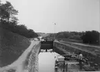 Kinda kanal Övre slussen vid Slattefors.Med fotografiet erhöll fotografen 5:e plats i Svenska Turistföreningens pristävlan 1902.