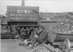 Malmlastare tar kaffepaus. Oxelösunds hamn 1901.