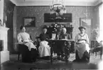 Fr.v. ?, Charlotta Andersson, Charles Andersson, och dottern Elisabeth.