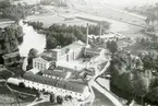 Flygfotografi över  Gefle Manufaktur och Strömsbro Gävle, Gästrikland, 1938.