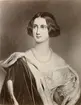 Målning. Porträtt av drottning Maria Friederike af Preussen, som gifte sig med  kung Maximilian II af Bayern. Senare blev hon mor till Ludwig och Otto. Hon föddes 1825 i Berlin och hon dog 1889 på slotten i Hohenschwangau. Porträtt  av Joseph Stieler som målade henne efter hennes ankomst till München. Hon ansågs vara otroligt vacker och fick en plats i kung Ludwigs I. skönhetsgalleri.