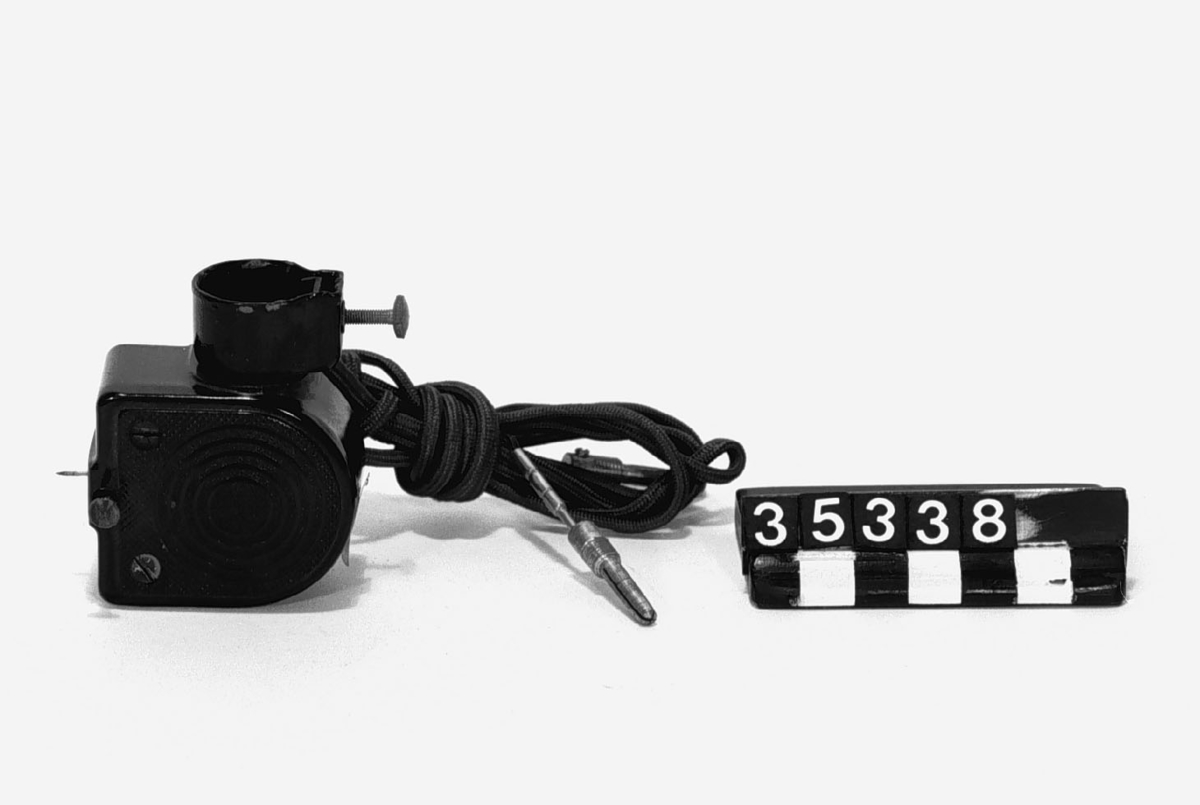 Elektrisk grammofonpickup för lösa stift, gjuten i bakelit.