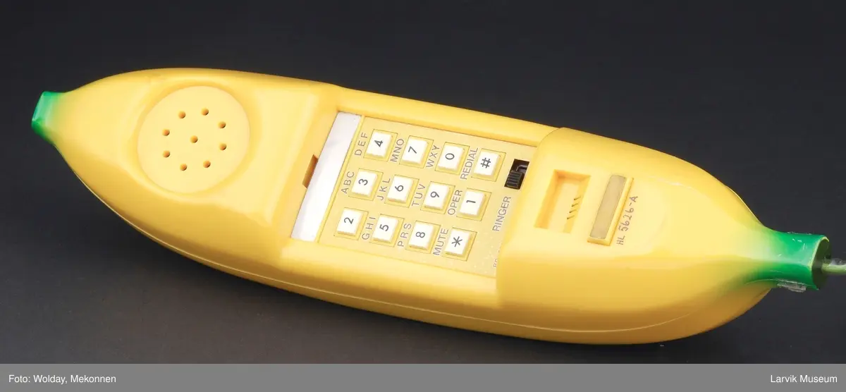 Form: Banan.
Telefon og tastatur i sammen.