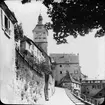 Skioptikonbild med motiv från Badtorweg i Schwäbische Hall med Josenturm i bakgrunden.
Bilden har förvarats i kartong märkt: Resan 1911. Schwäbisch Hall 9. XV. Text på bild: 