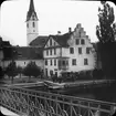 Skioptikonbild med motiv av Kirche von Stein am Rhein.
Bilden har förvarats i kartong märkt: Resan 1904. Hamburg. Text på bild: 