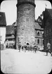 Skioptikonbild med motiv av Stolberg im Harz, tornet Seigerturm vid södra stadsmursporten.
Bilden har förvarats i kartong märkt: Vårresan 1909. Blankenburg 3. Halberstadt 2. XI. Text på bild: 