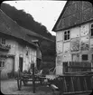 Skioptikonbild med motiv från bakgråd i byn Stolberg, Tyskland.
Bilden har förvarats i kartong märkt: Vårresan 1909. Stolberg 8. X. Text på bild: 